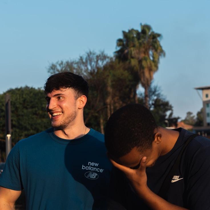 Avery Lin, Lead Design Curator at Sea Grass Cedar Fable, reviewing corporate floral arrangements